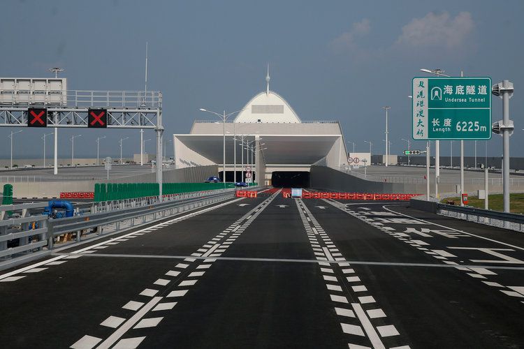Chinese President Xi Jinping opens world's longest sea-crossing bridge