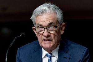 Fed will tighten credit faster, expects to raise interest rates 3 times in 2022