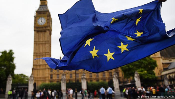 UK's Brexit minister warns of risks to quick departure